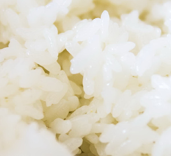 How to make perfect sushi rice. Firm shiny grains or rice seasoned with vinegar, sugar and salt.